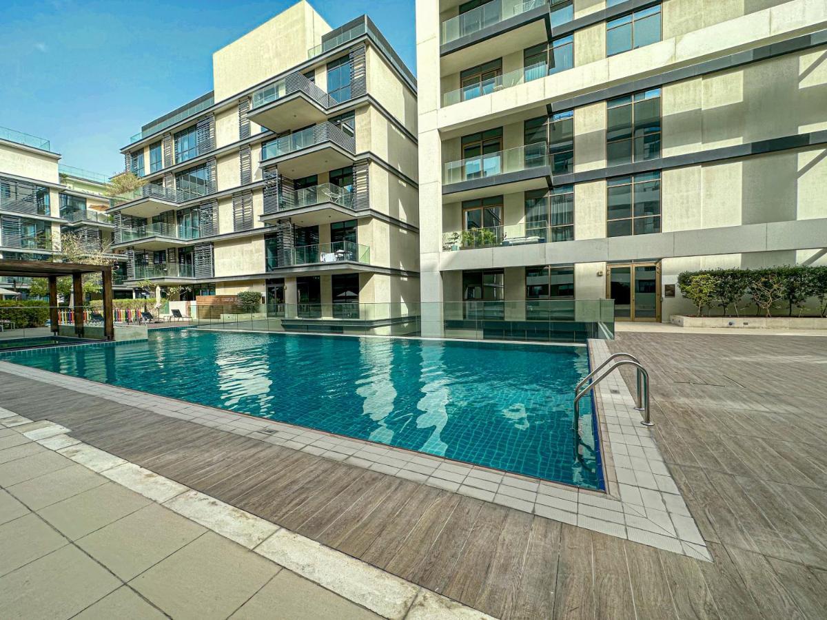 Apartment Higuests - Charming Retreat In Citywalk With Balcony And Pool